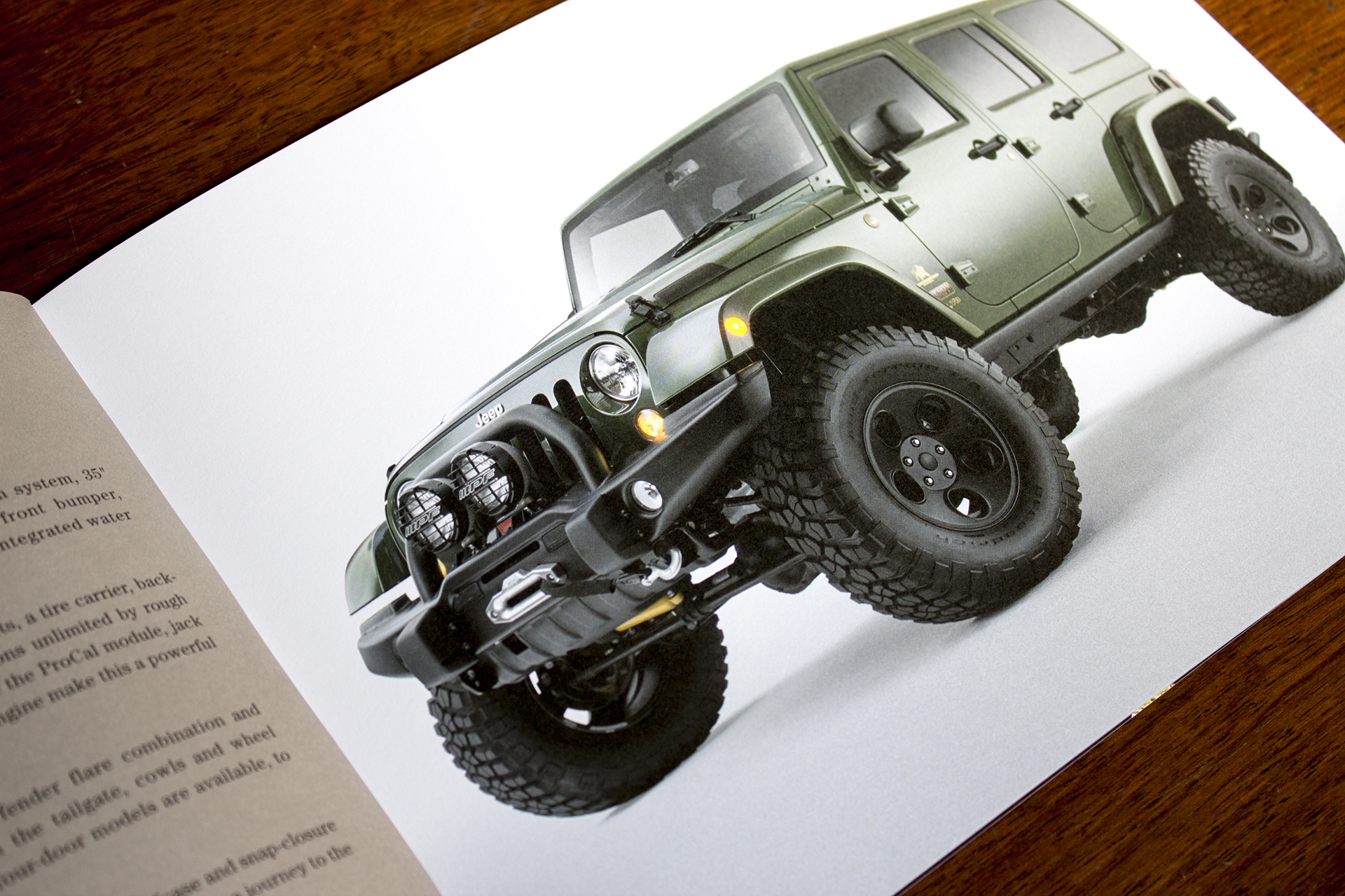 A page in the brochure showing a brightly photographed vehicle