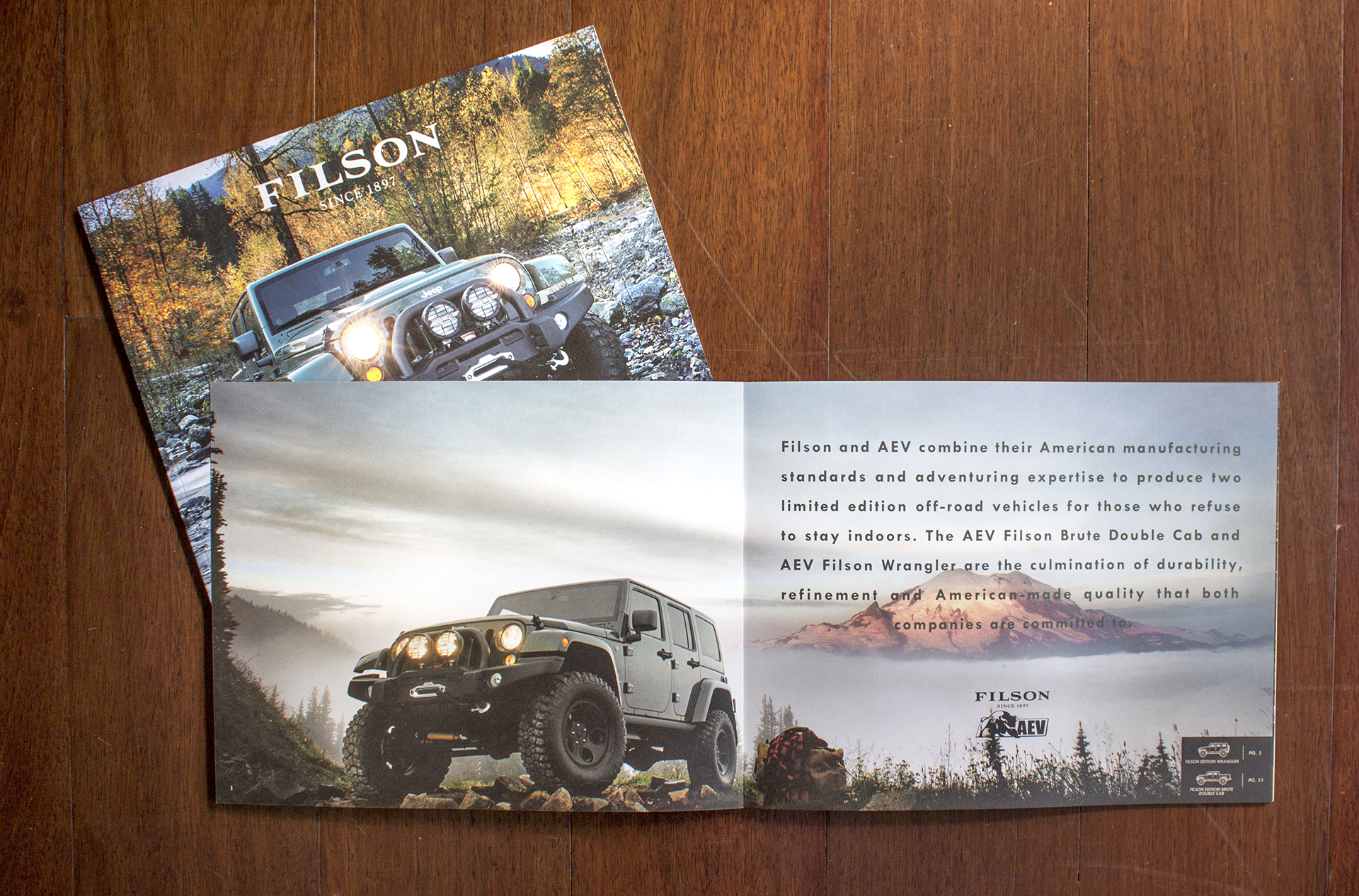 An open Filson brochure with dramatic landscape photography