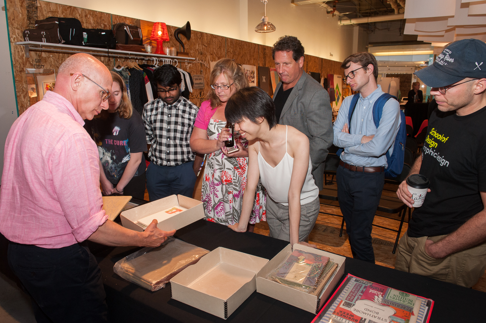 Chicago visitors to the Strathmore archive inspect prints