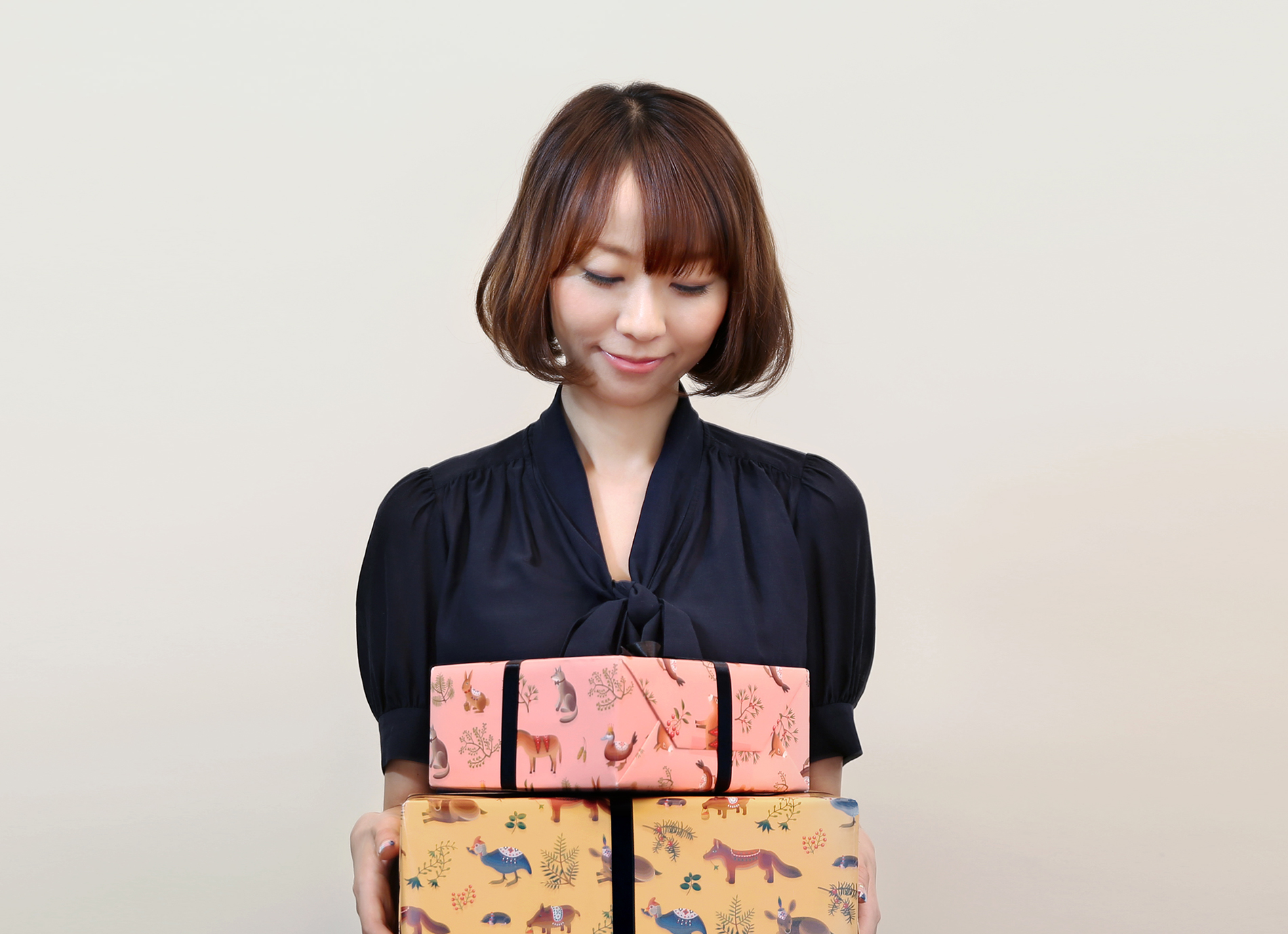 Mimi Kim with boxes of product