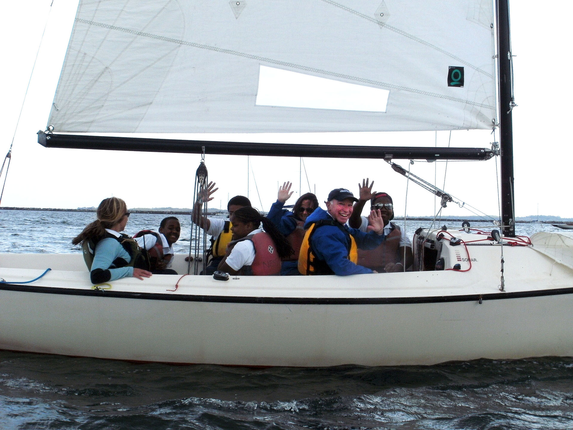 A group of sailors on the water