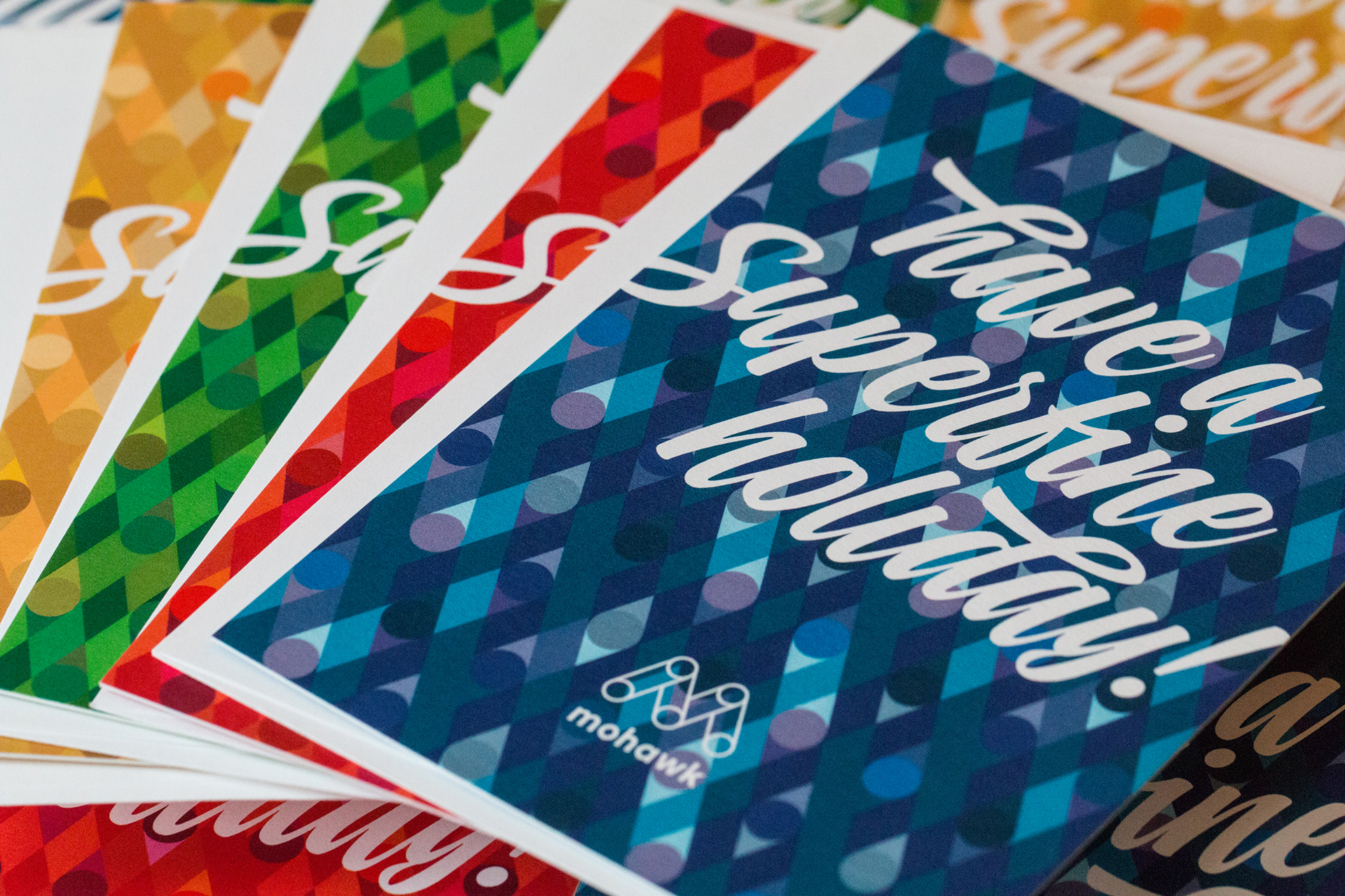 Four Superfine holiday cards with the words "Have a Superfine Holiday" 