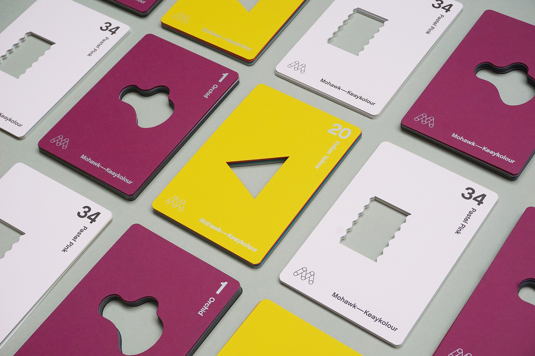 Purple, yellow, and white Keaykolour selector cards arranged in a grid pattern