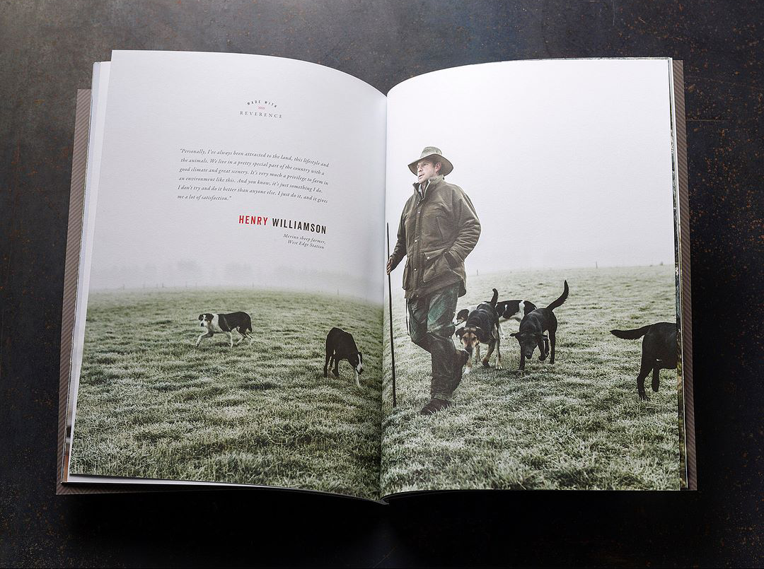 Open booklet showing the printed photograph of the shepherd and black sheep