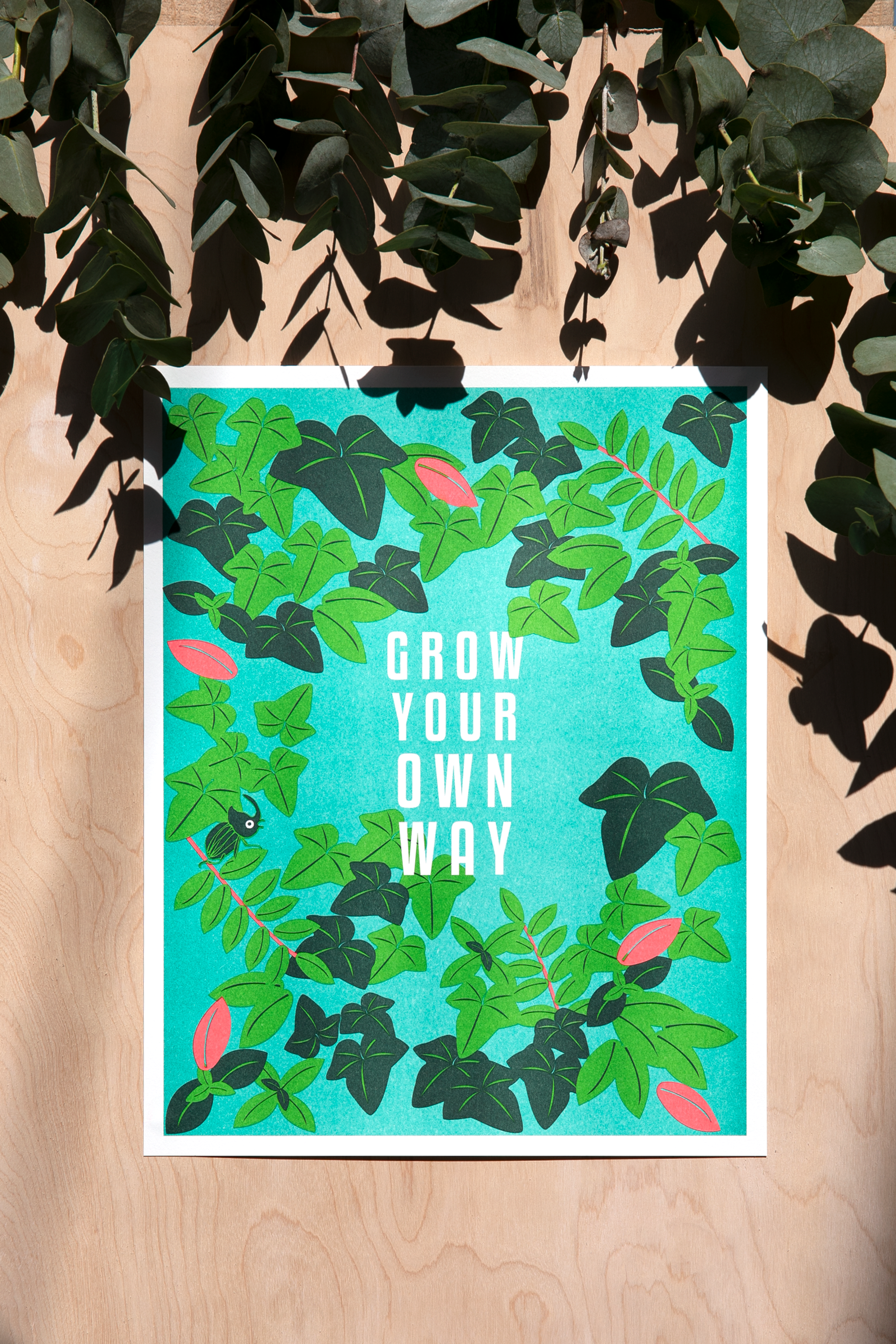 Riso print with flowers that says Grow Your Own Way