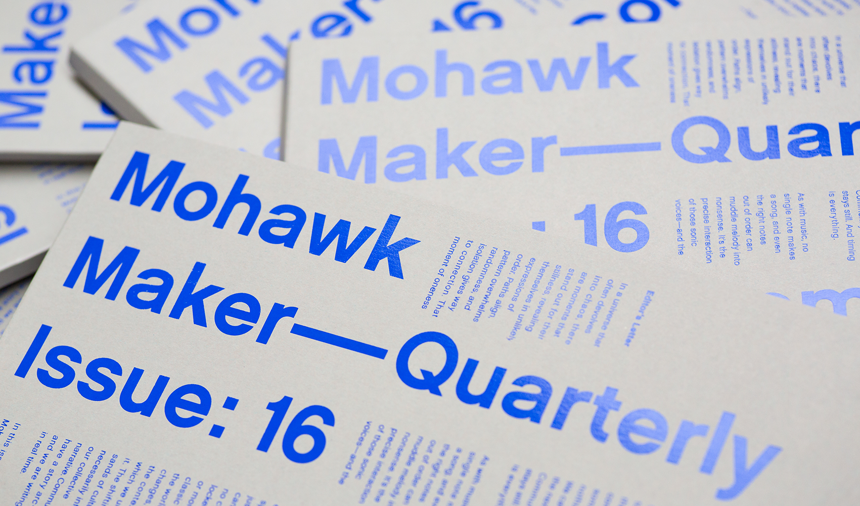Covers close up with blue foil typography