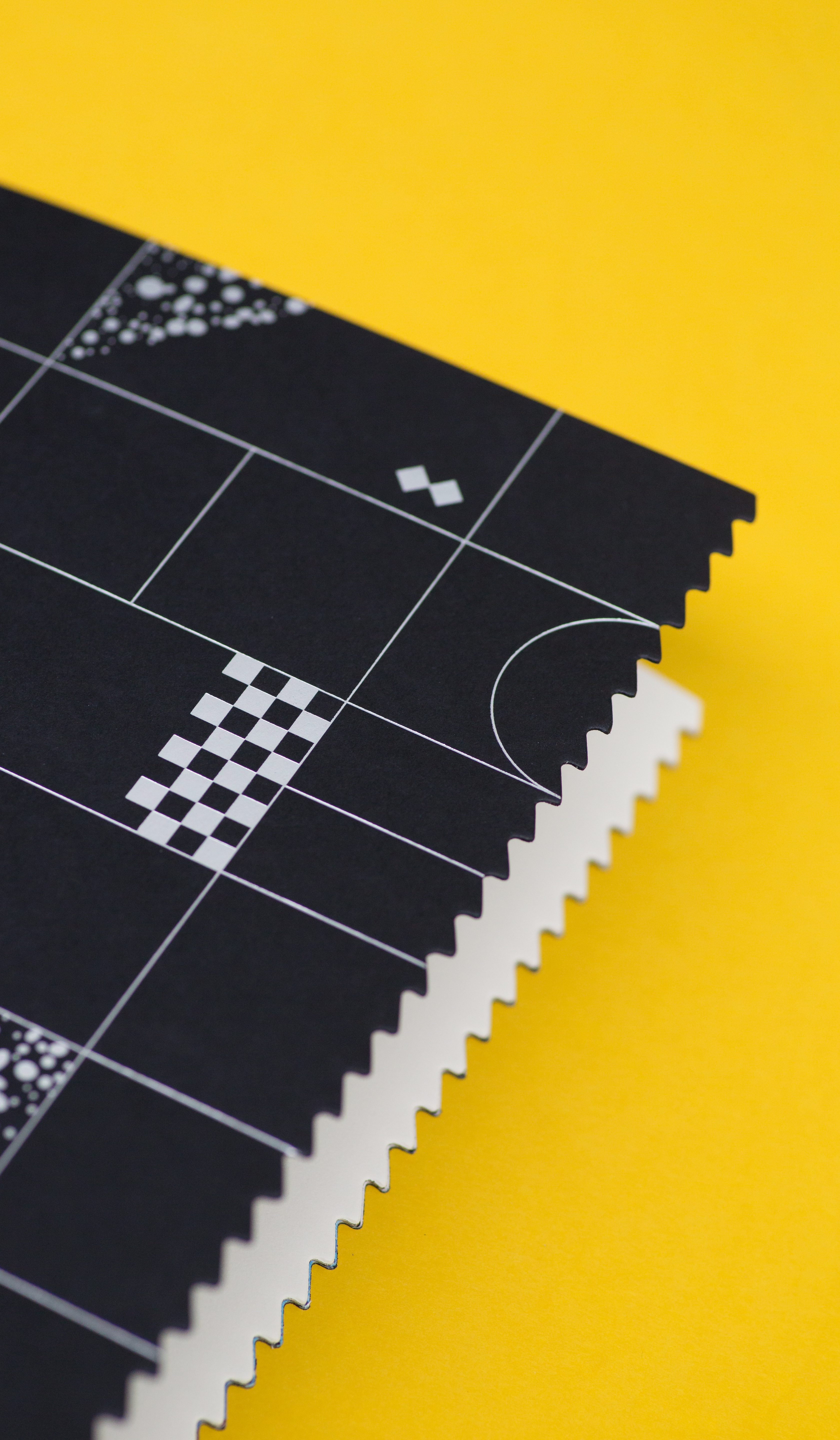 Diecut details on each book contribute to the tactile quality of each object.