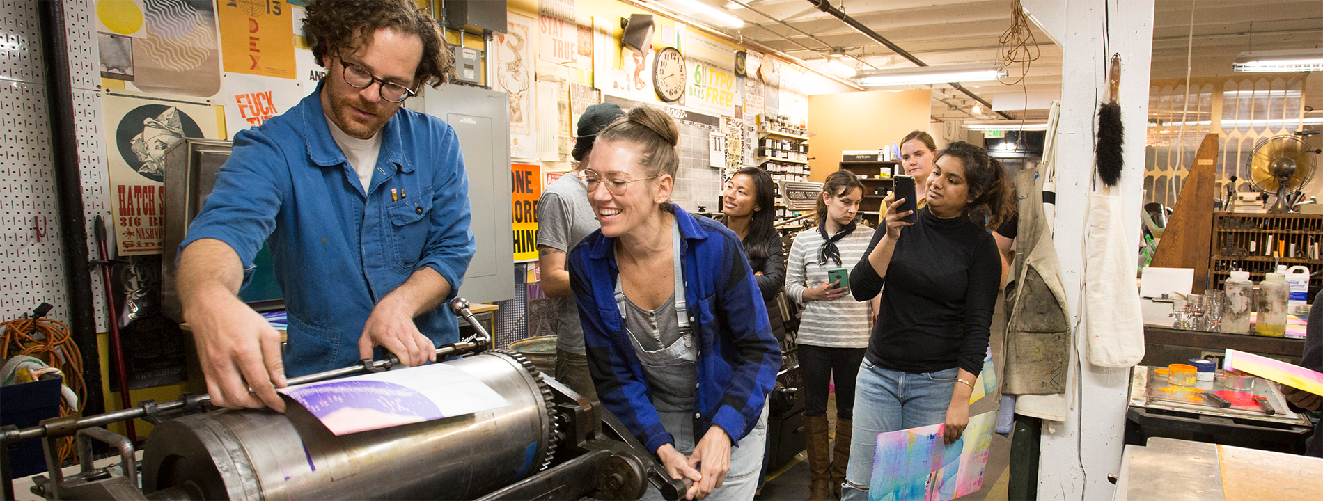 Image of makers learning about letterpress in a workshop