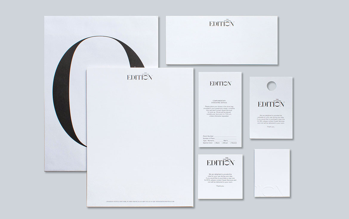 stationery and business cards for New York Edition arranged in a grid pattern