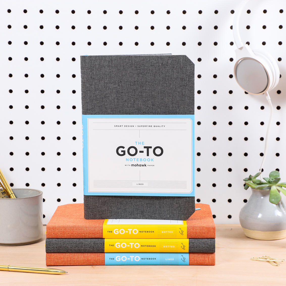 A stack of Go-To chronicle notebooks