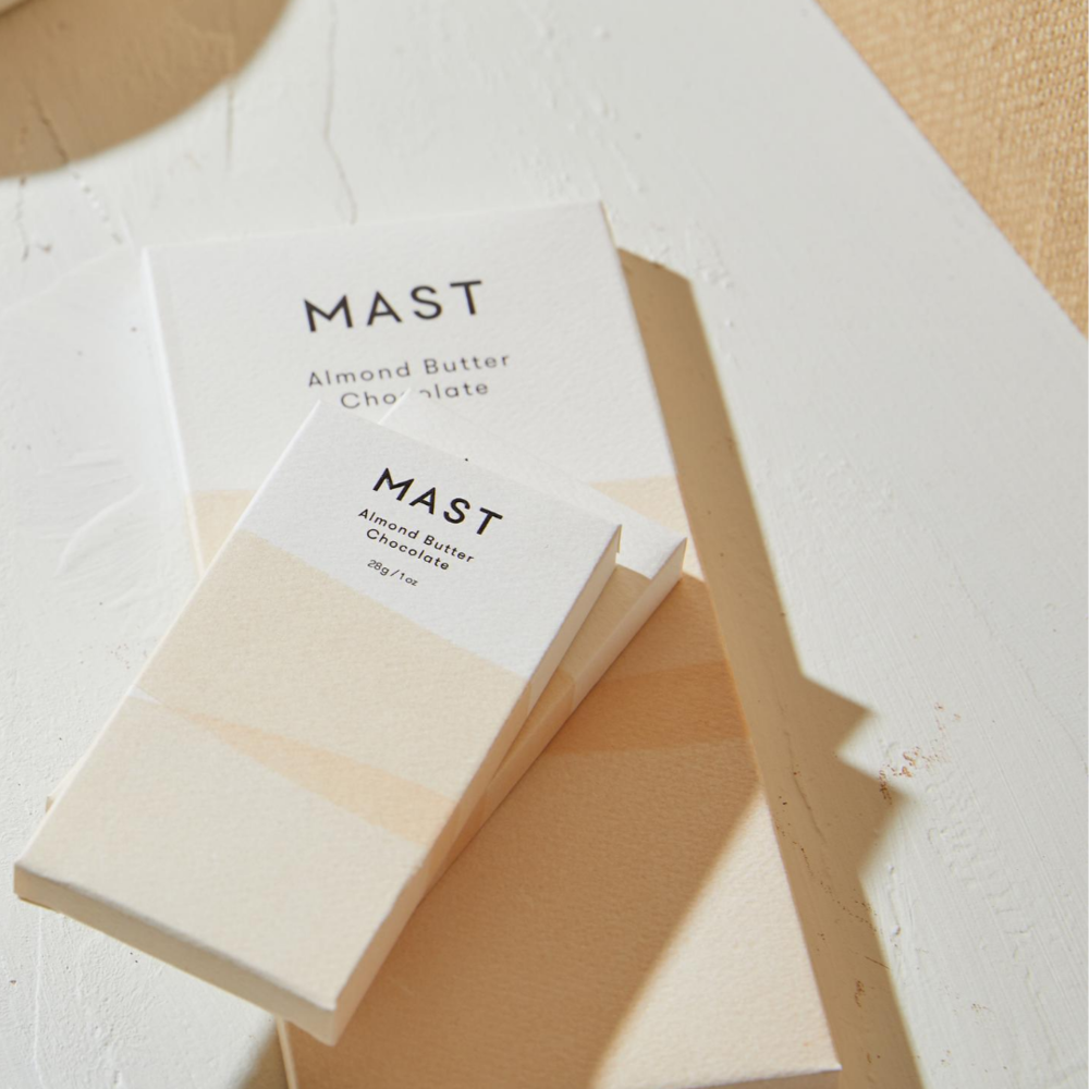 Two Mast Brothers chocolate bars stacked on top of one another