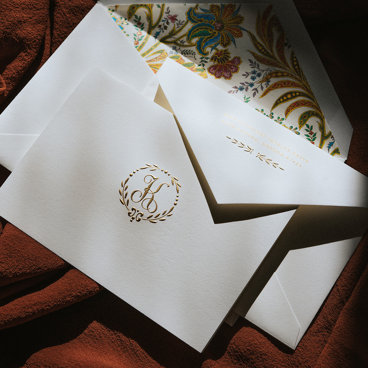A piece of monogrammed Crane stationery with a matching envelope