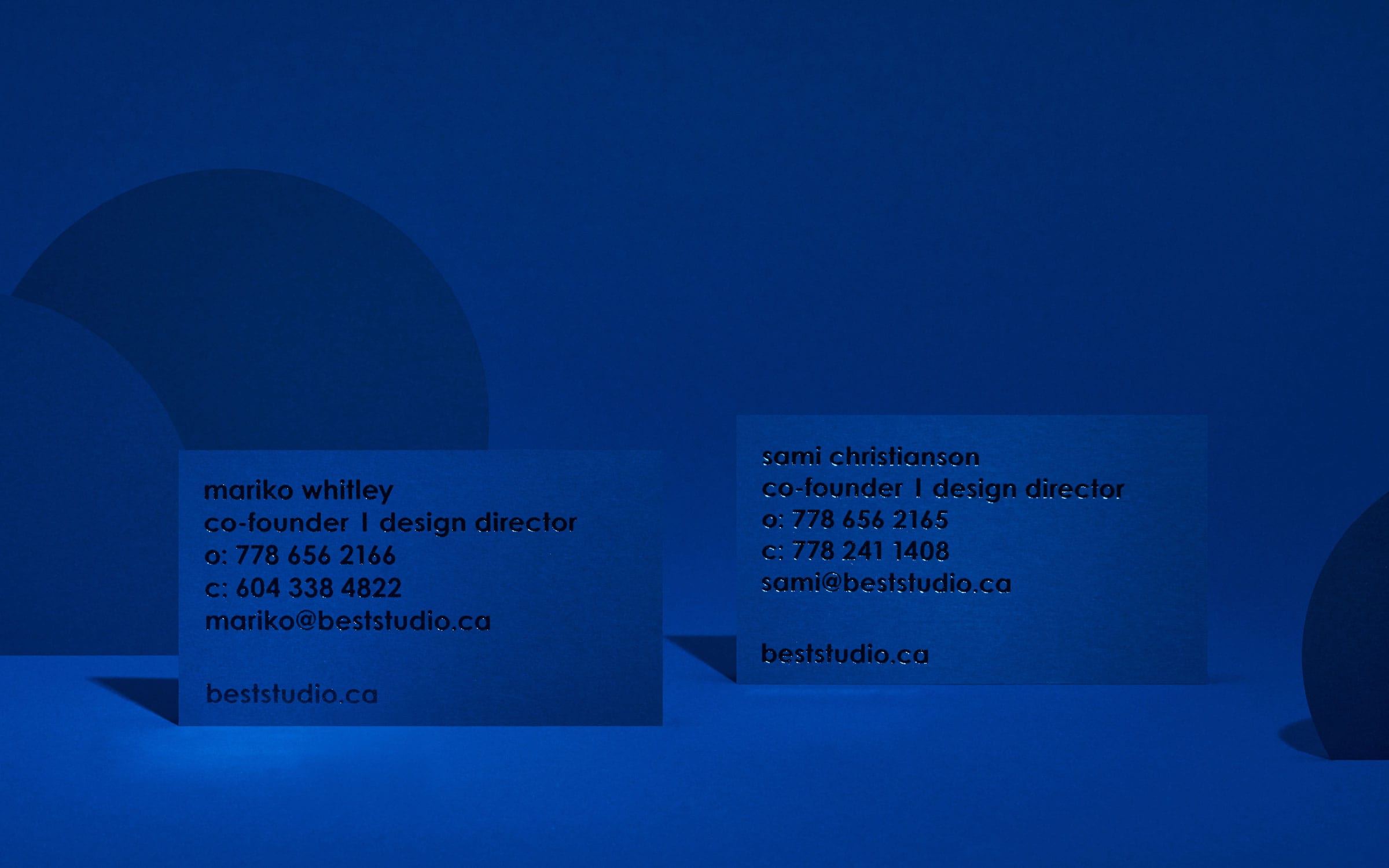 Back view of Best Studio's business cards
