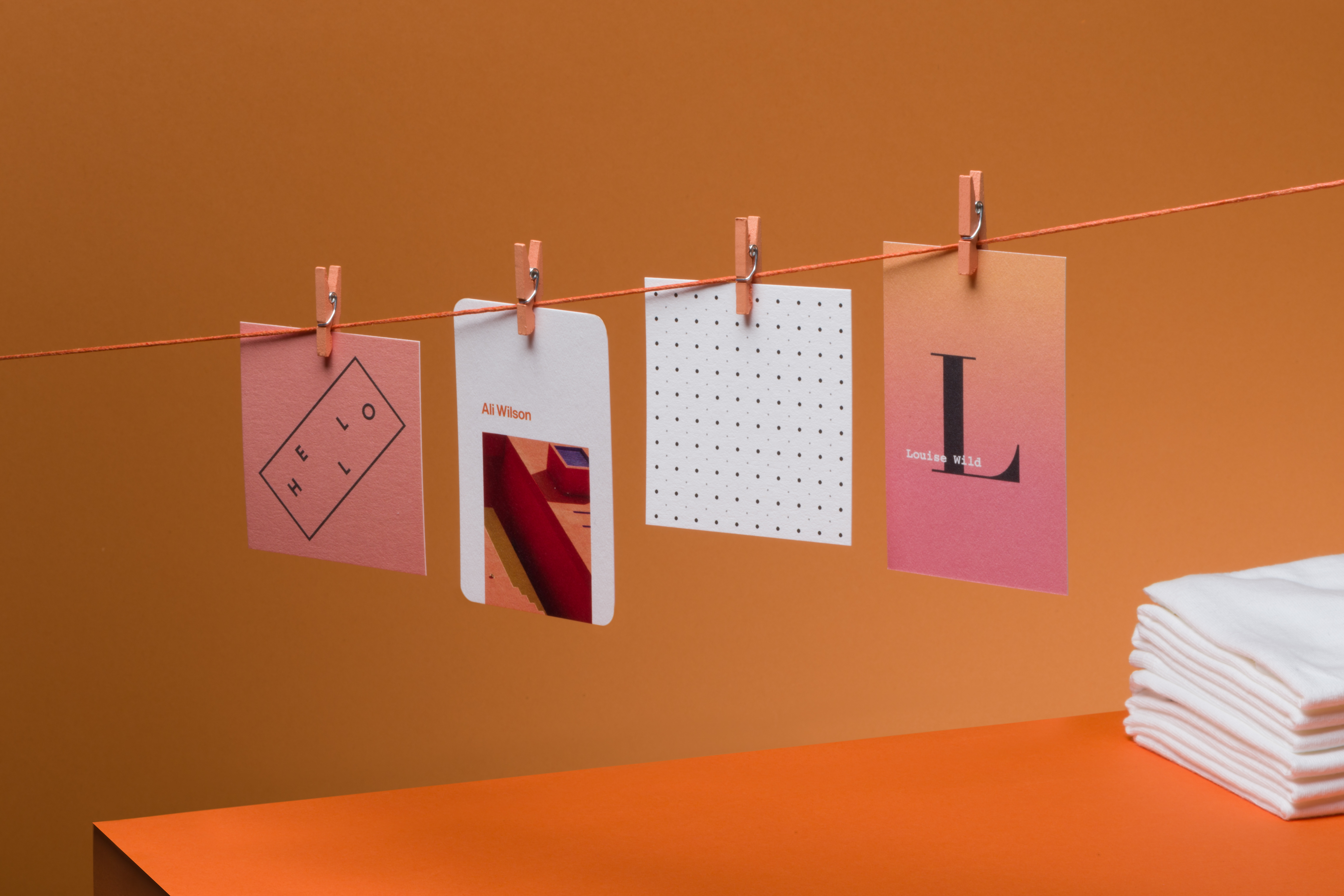 cotton paper samples clipped on a clothesline
