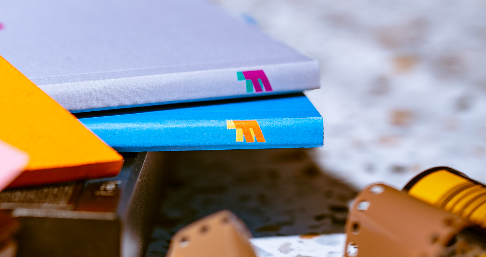 close-up of flipbook spines with logo