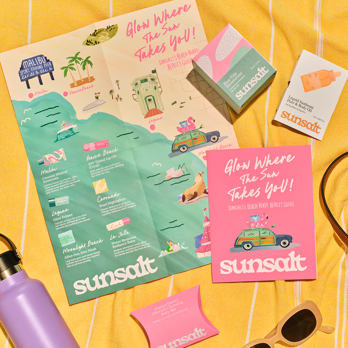 Sunsalt brand materials spread out on blanket