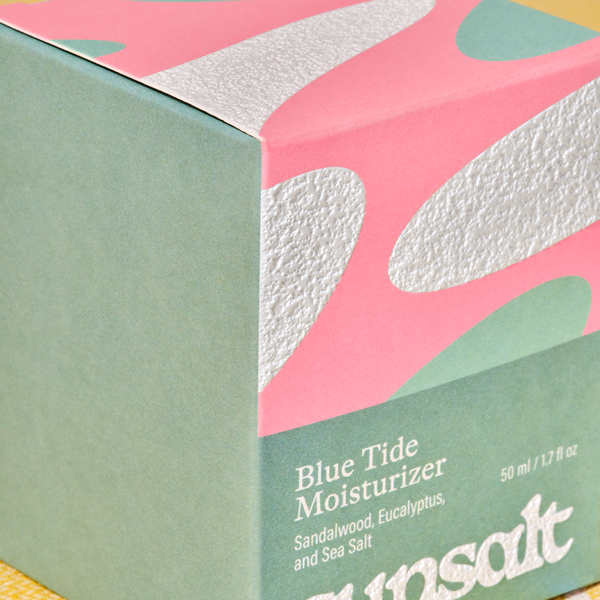 close up of micro emboss on folding box