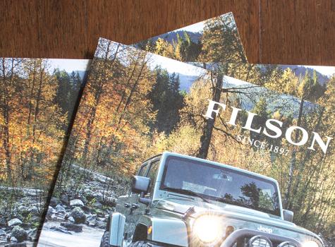 Close-up of a stack of Filson brochures
