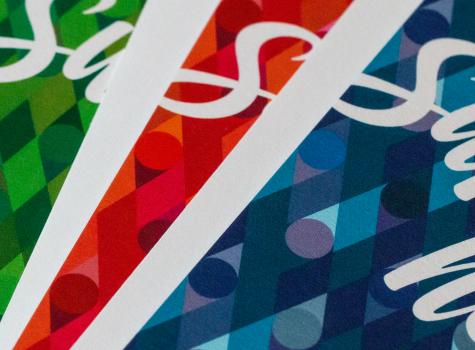 Close-up of four different colorways of the holiday card from 2015