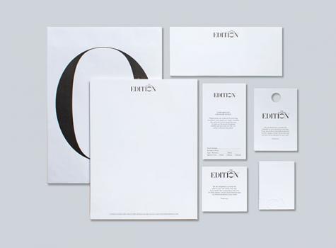 stationery and business cards for New York Edition arranged in a grid pattern